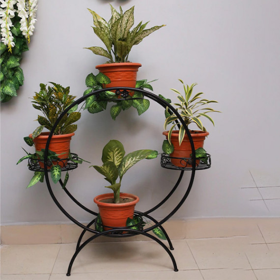 https://weavestyle.in/vi/products/set-of-4-black-solid-metal-planters-with-round-shaped-stand